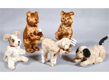 Appraisal: Five antique mechanical toys including two standing bears with googly