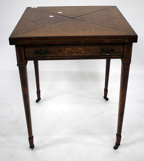 Appraisal: A VICTORIAN ROSEWOOD AND INLAID ENVELOPE FOLD OVER CARD TABLE