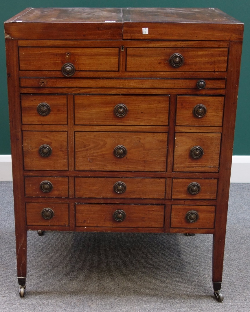 Appraisal: An early th century mahogany lift top wash stand with