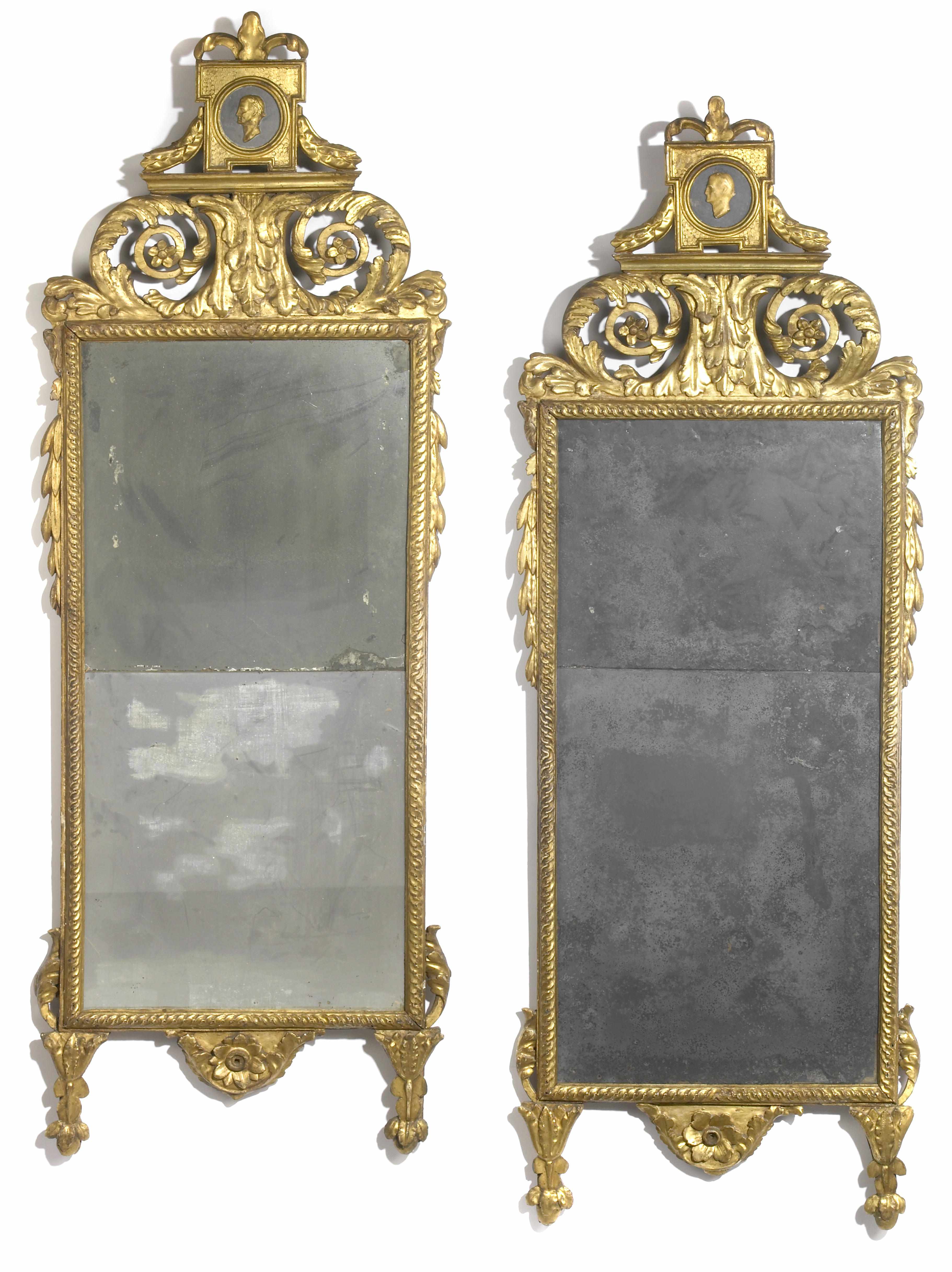 Appraisal: A pair of Italian Neoclassical carved giltwood mirrors fourth quarter