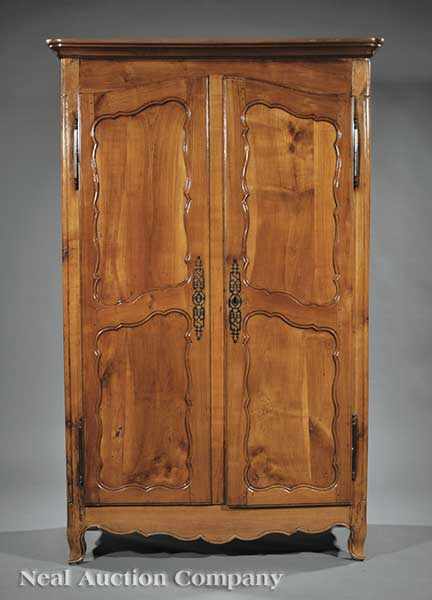 Appraisal: An Antique Louis XV-Style Fruitwood Armoire th c with restorations