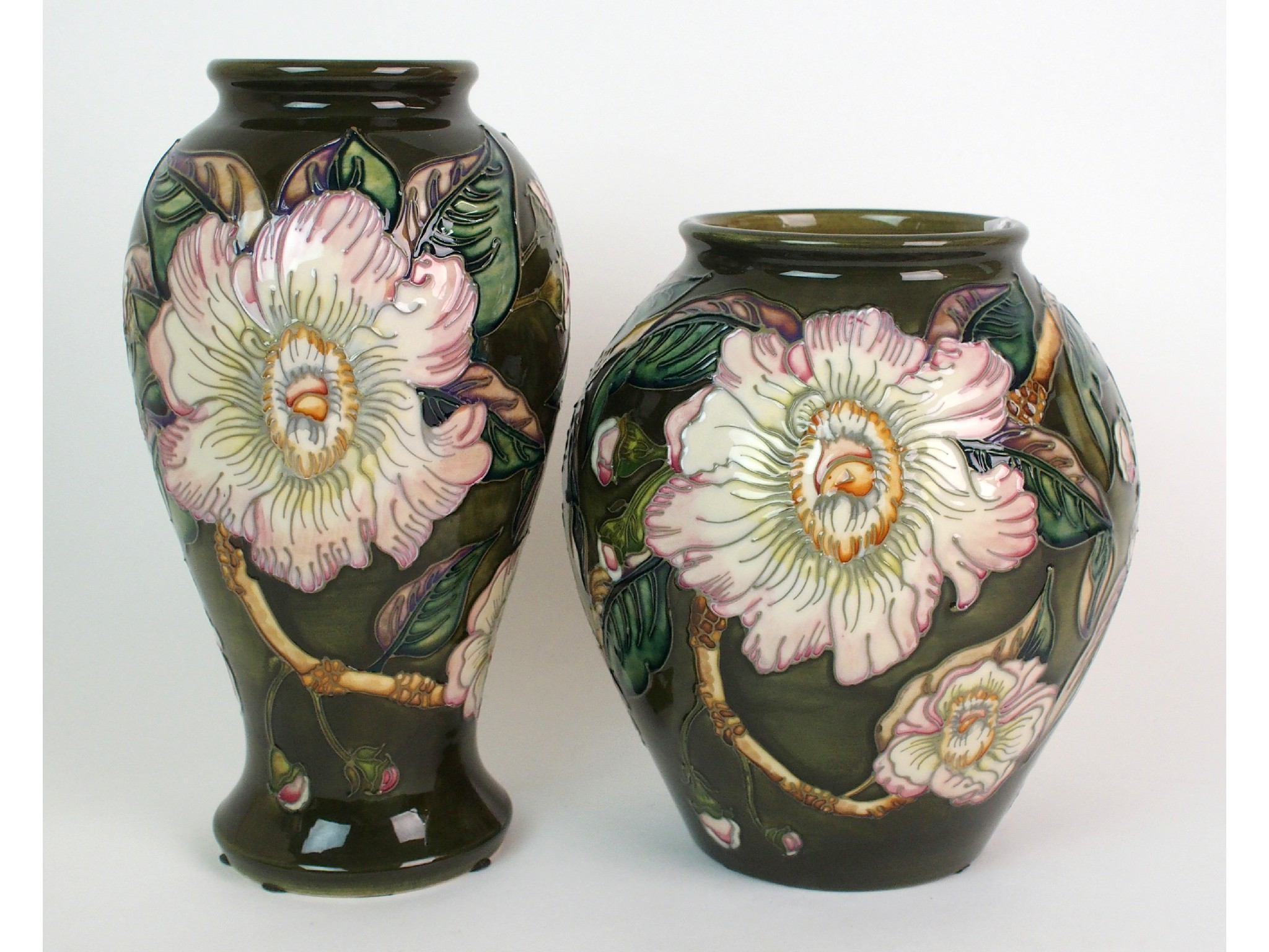 Appraisal: Two Moorcroft Pottery Gustavia Augusta vases by Gillian Powellcirca one