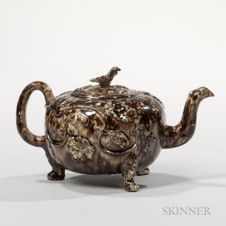 Appraisal: Staffordshire Brown Tortoiseshell-glazed Cream-colored Earthenware Teapot and Cover England c