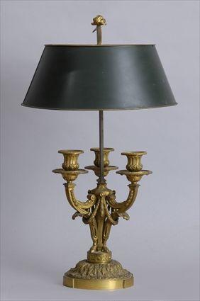 Appraisal: LOUIS XVI-STYLE GILT-BRONZE THREE-LIGHT BOULLIOTTE LAMP The c-scroll arms joined