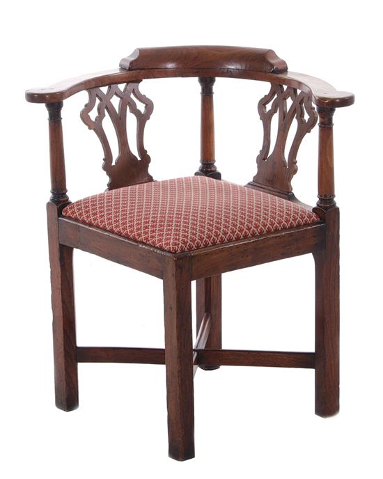 Appraisal: Georgian yew corner chair circa pierced splats upholstered seat and