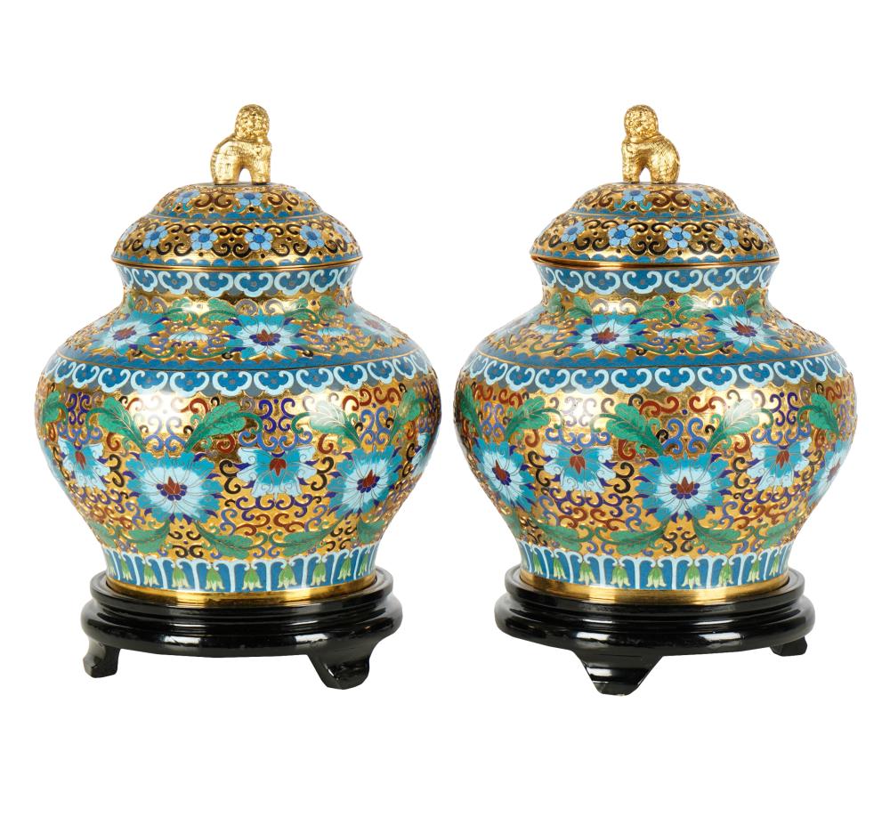 Appraisal: PAIR OF CLOISONNE ENAMEL COVERED JARSunmarked with wooden stands with