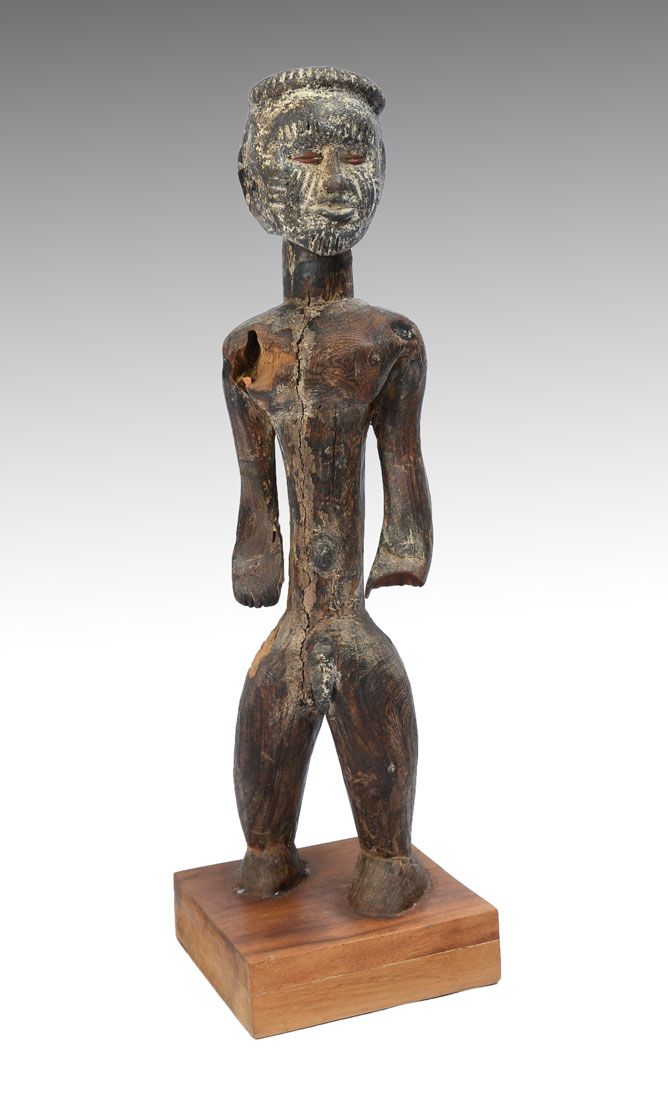 Appraisal: WEST AFRICAN IDOMA CARVED MALE FIGURE Carved figure of a