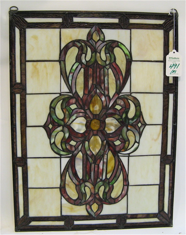 Appraisal: A PAIR OF STAINED AND LEADED GLASS WINDOW PANELS having