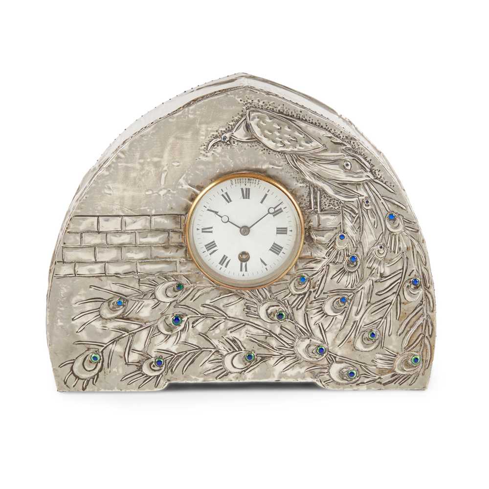 Appraisal: SCOTTISH ARTS CRAFTS MANTEL CLOCK CIRCA the circular enamel dial