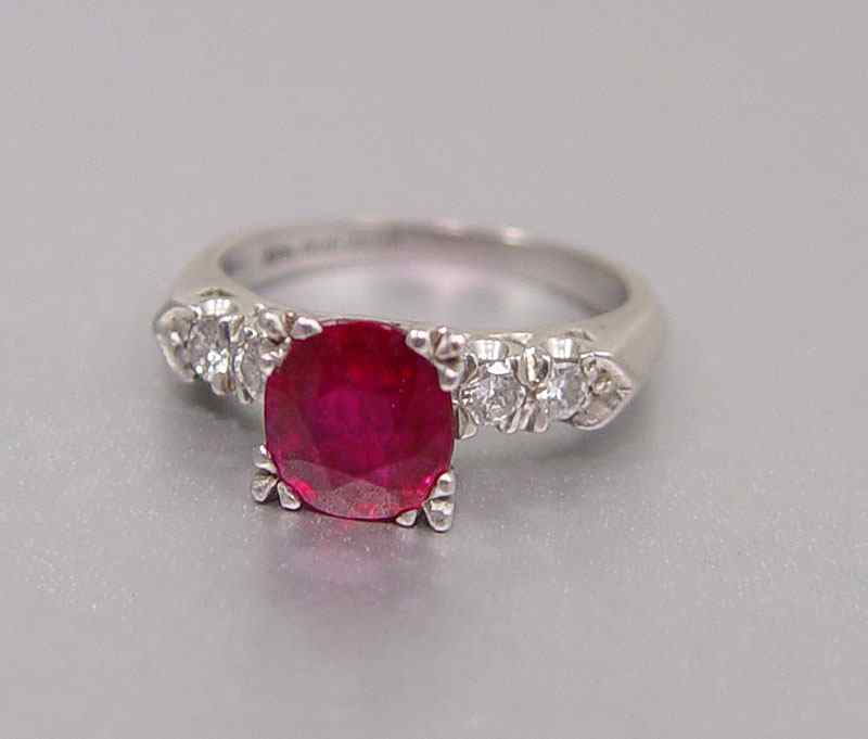 Appraisal: PLATINUM DIAMOND RUBY RING Platinum ring contains one round shaped