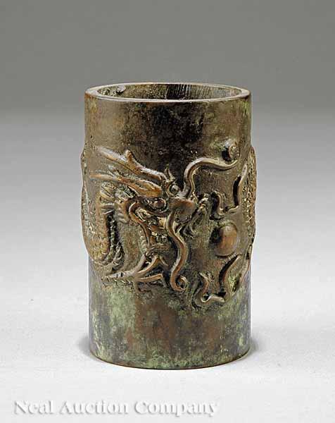 Appraisal: An Asian Bronze Brushpot probably th c or earlier the