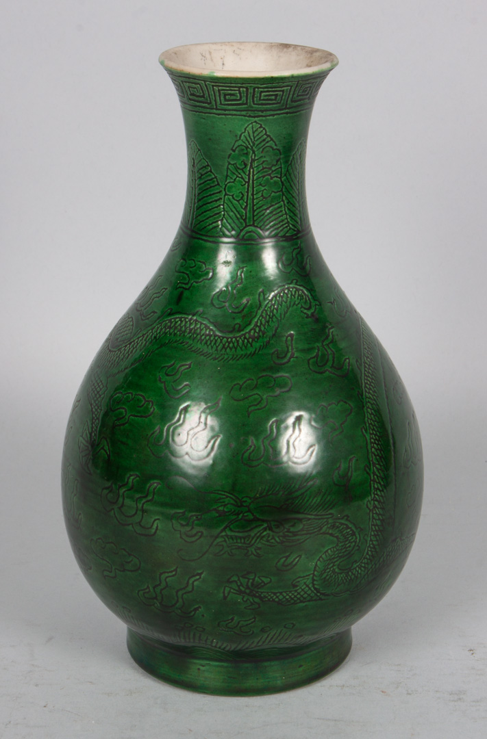 Appraisal: Chinese green glazed porcelain vase with sgraffito dragon decoration in