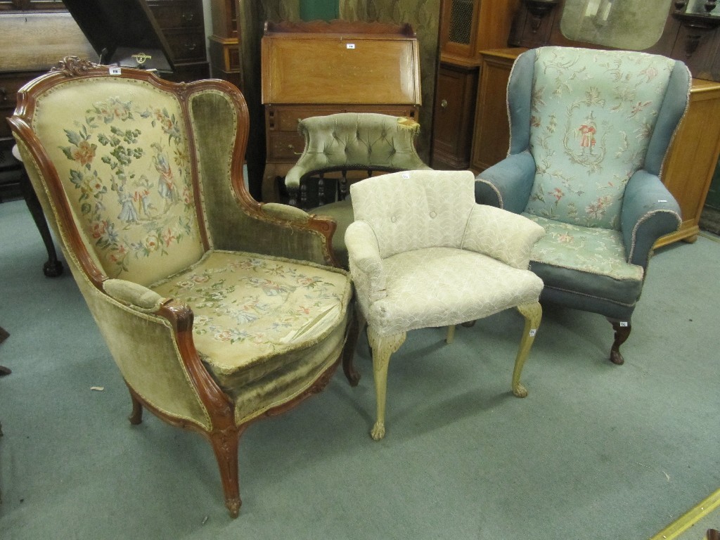 Appraisal: Reproduction and floral upholstered armchair fireside armchair swivel desk and