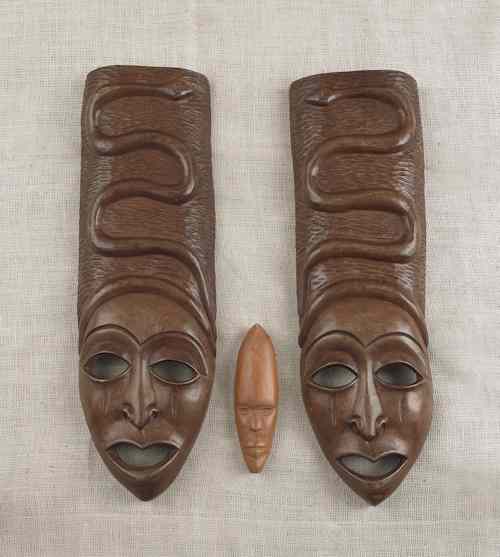 Appraisal: Group of African wooden carvings to include figures and masks