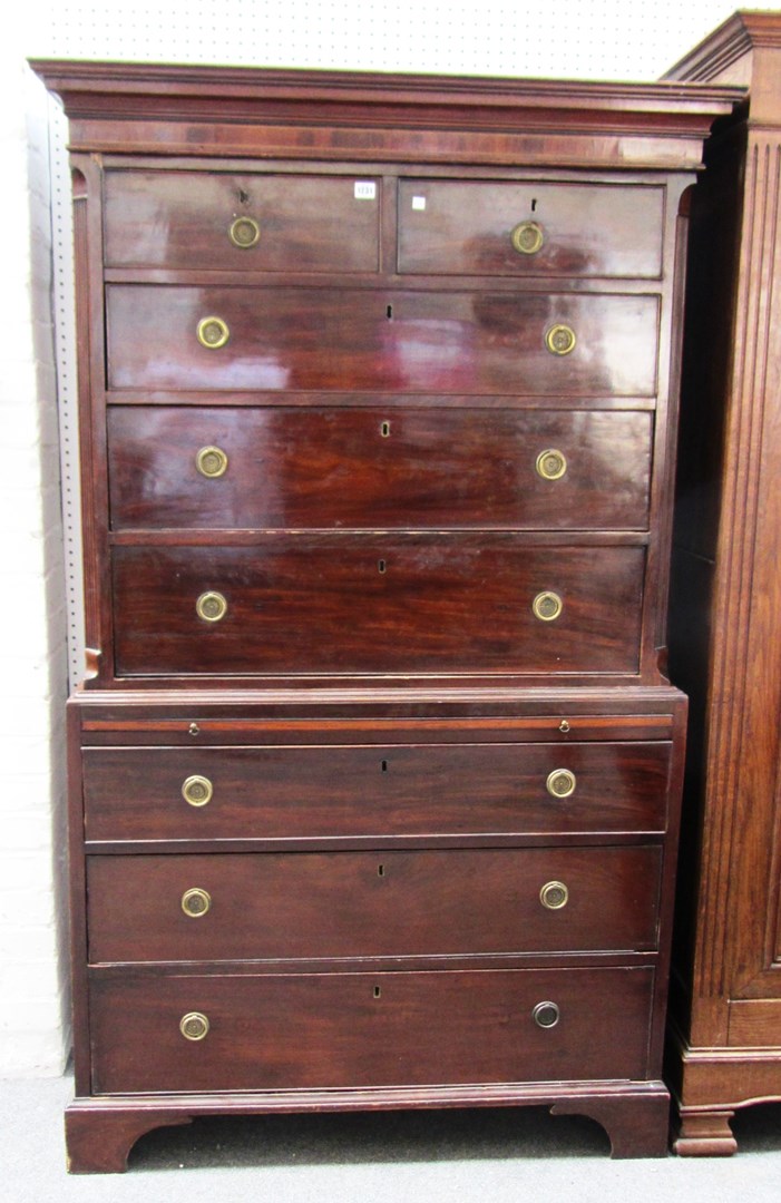 Appraisal: A George III mahogany chest on chest of two short