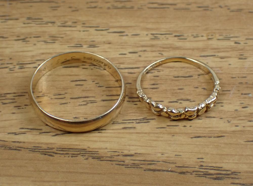 Appraisal: TWO VINTAGE FOURTEEN KARAT YELLOW GOLD BANDS lady's k gold