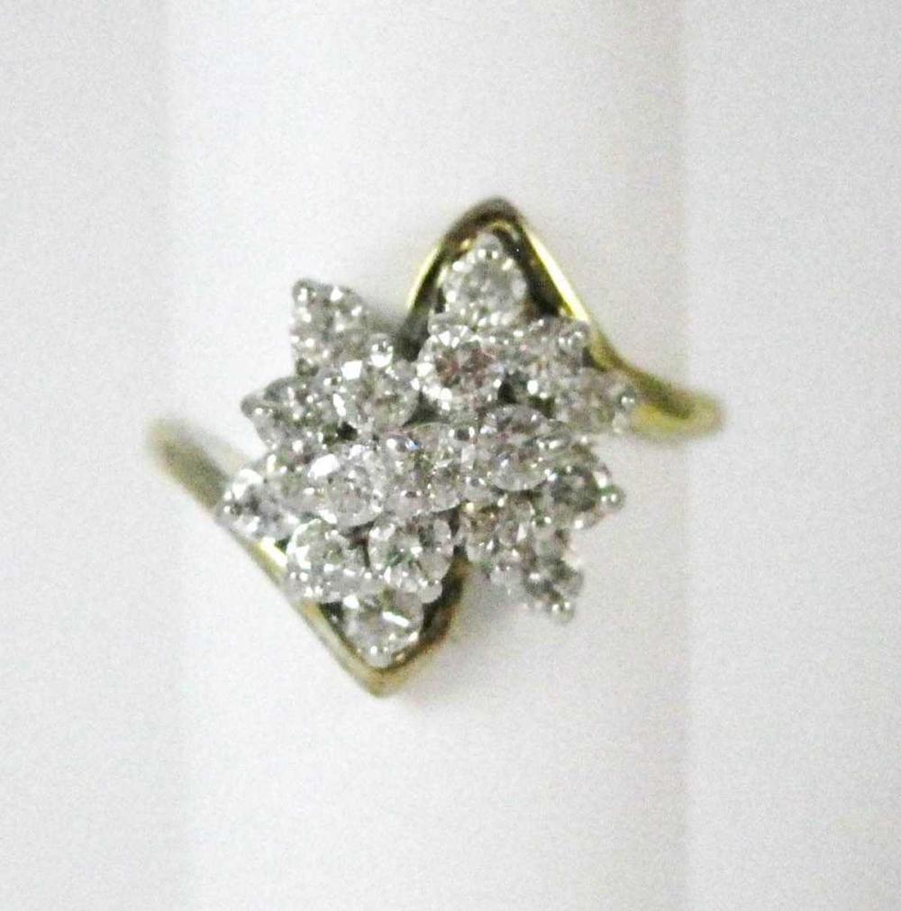 Appraisal: DIAMOND AND FOURTEEN KARAT GOLD RING The k yellow gold