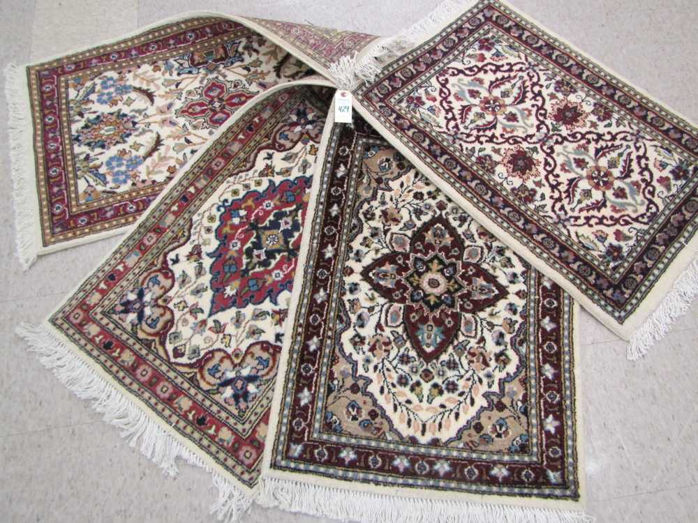 Appraisal: FOUR HAND KNOTTED ORIENTAL SAMPLER MATS Pakistani-Persian sizes ' x