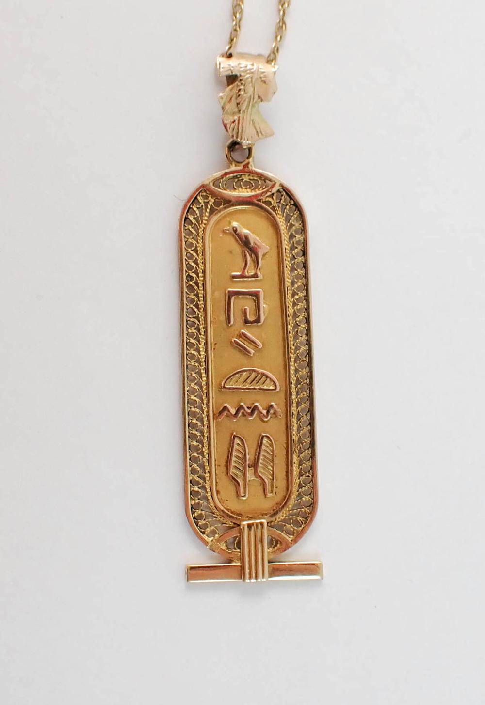 Appraisal: EGYPTIAN STYLE YELLOW GOLD PENDANT NECKLACE with a - k