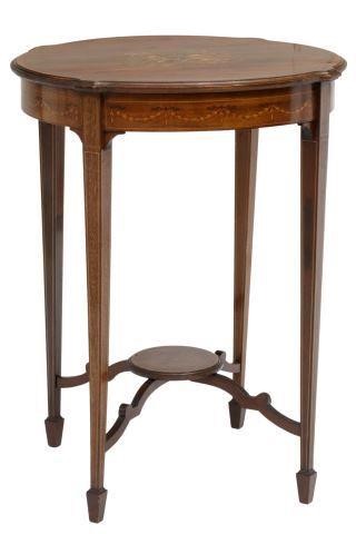 Appraisal: English Adams style mahogany occasional lamp table th c banded