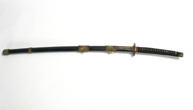 Appraisal: Japanese Samurai sword post WWII era black scabbard with ornate