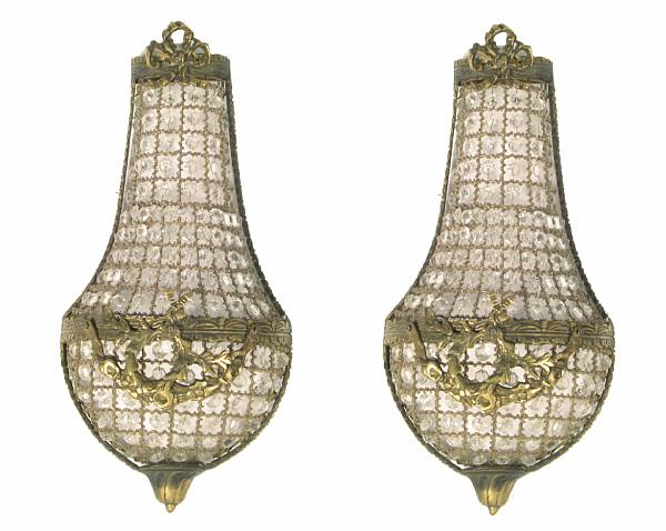 Appraisal: A set of four Neoclassical style bronze and crystal sconces