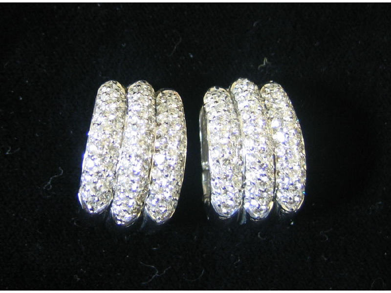 Appraisal: DIAMOND EARRINGS k white gold pierced earrings with clip backs