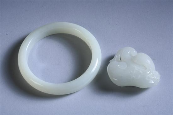 Appraisal: CHINESE WHITE JADE PENDANT AND BRACELET Pendant carved to depict