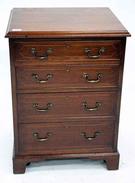 Appraisal: A GEORGIAN STYLE SMALL CHEST OF FOUR GRADUATED LONG DRAWERS