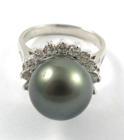 Appraisal: BLACK PEARL AND DIAMOND RING k white gold centering a