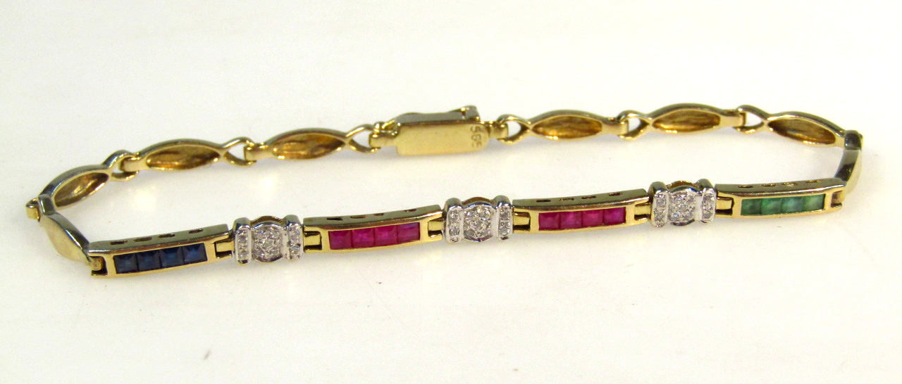 Appraisal: A fancy link bracelet with various coloured stones broken by