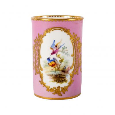 Appraisal: An English porcelain cylindrical pink ground vase painted birds in