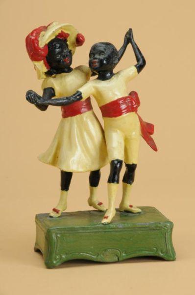 Appraisal: Black Americana Dancing Metal Figures America ca a finely detailed