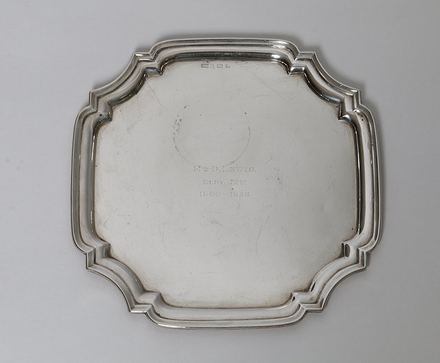 Appraisal: A SILVER SALVER of square shape with canted corners marks