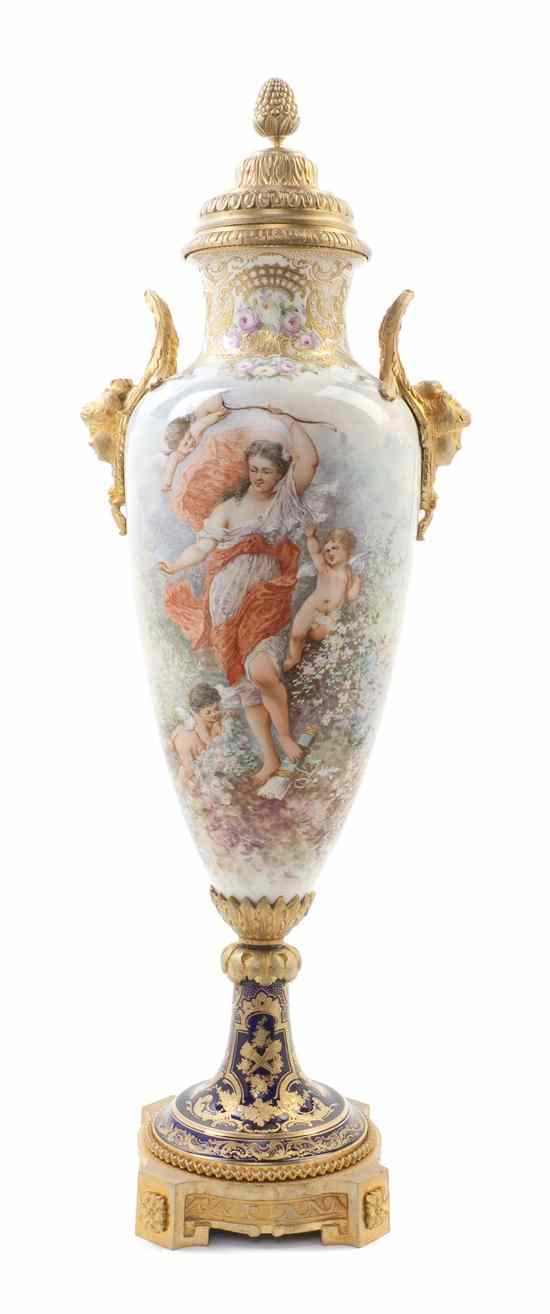 Appraisal: A Sevres Style Porcelain and Gilt Bronze Mounted Urn continuously