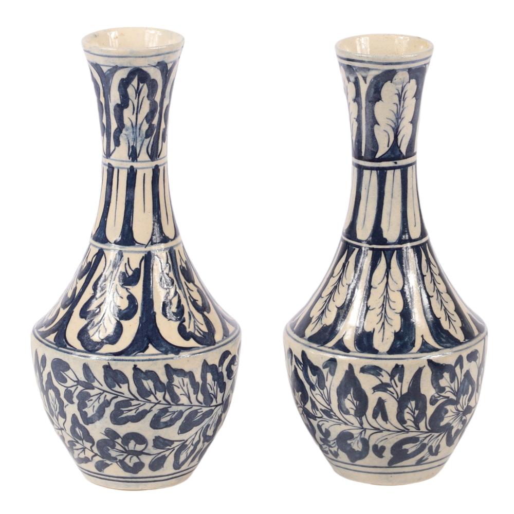 Appraisal: PAIR CHINESE YUAN STYLE BLUE AND WHITE GLAZE EARTHENWARE STONEWARE