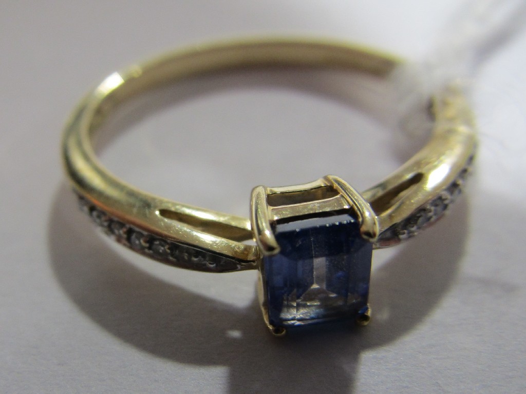 Appraisal: Nine carat gold tanzanite and diamond set dress ring with