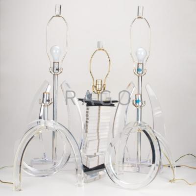 Appraisal: LUCITE Five table lamps two pairs one single s Foil