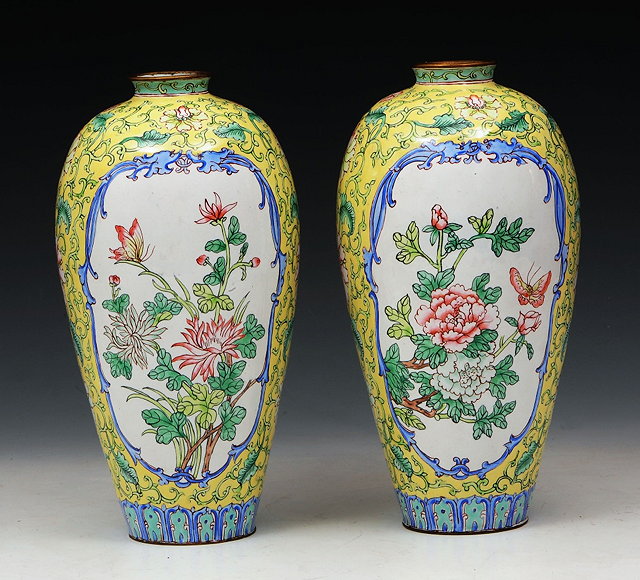 Appraisal: A PAIR OF CHINESE YELLOW GROUND ENAMEL VASES painted with