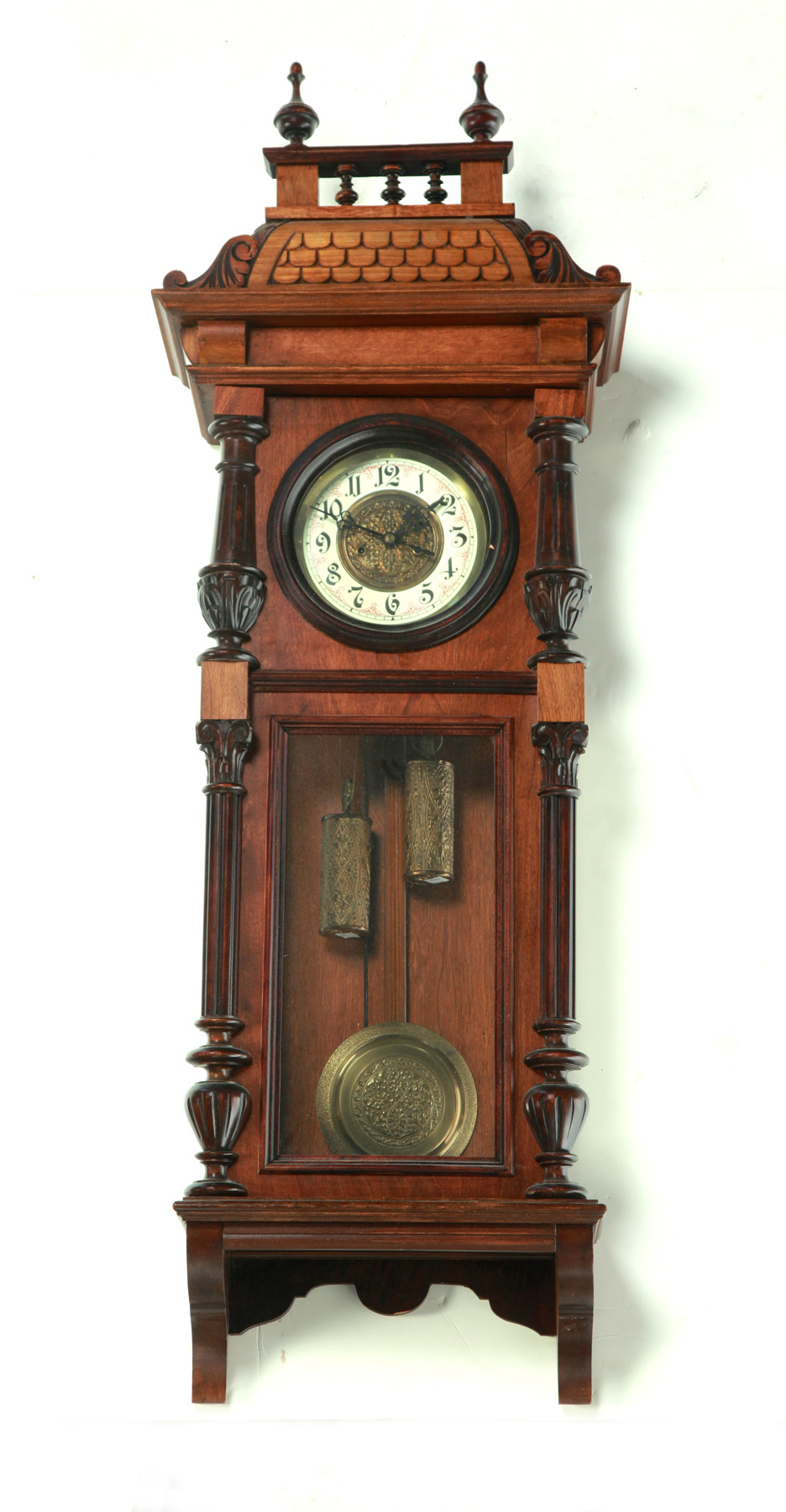 Appraisal: ORNATE TWO-WEIGHT WALL CLOCK Germany th quarter- th century Mahogany