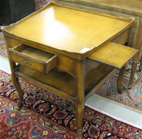 Appraisal: TWO-TIER PROVINCIAL STYLE LAMP TABLE Ruder Furniture Co New York