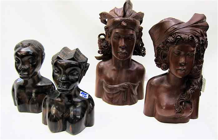 Appraisal: FOUR HAND CARVED EXOTIC HARDWOOD BUSTS pair Polynesian women with