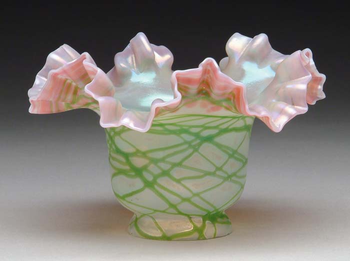 Appraisal: LOETZ-TYPE SHADE Opalescent glass with applied green threading and cranberry