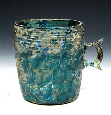 Appraisal: A LATE ROMAN EARLY ISLAMIC BLUE GLASS TANKARD of cylindrical