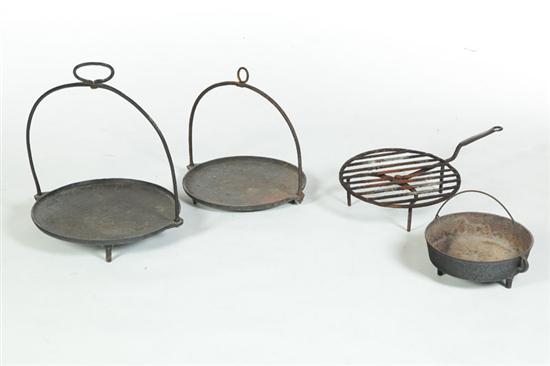 Appraisal: FOUR WROUGHT IRON KITCHEN ITEMS American th century Two hanging