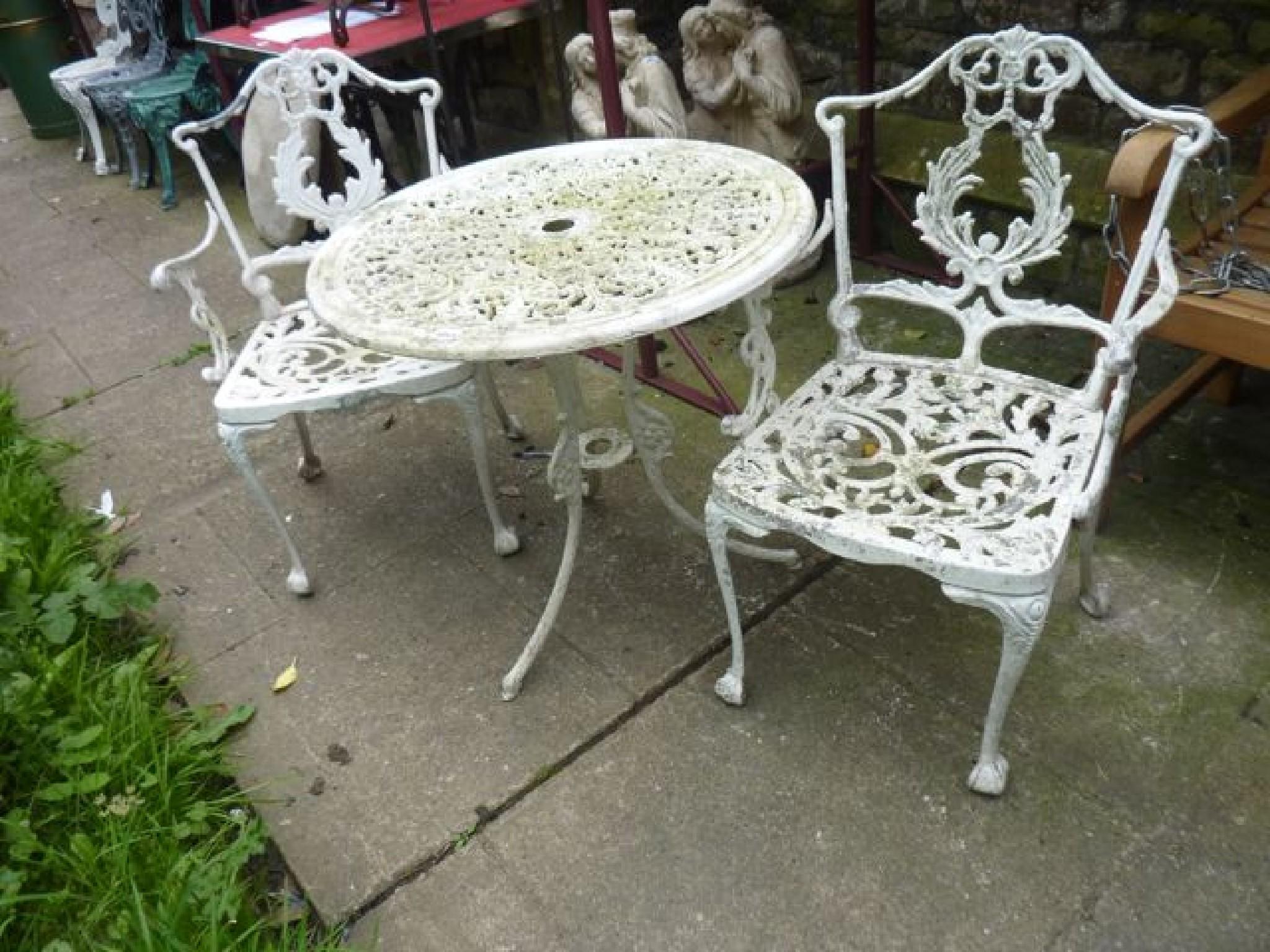 Appraisal: A decorative cast aluminium garden table of circular form with