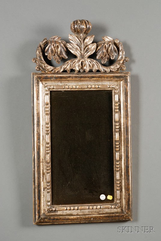 Appraisal: Giltwood Mirror Italy th century silver gilt foliate carved crest