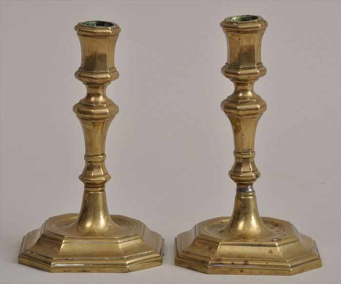 Appraisal: PAIR OF GEORGE I BRASS CANDLESTICKS Each octagonal knopped stem