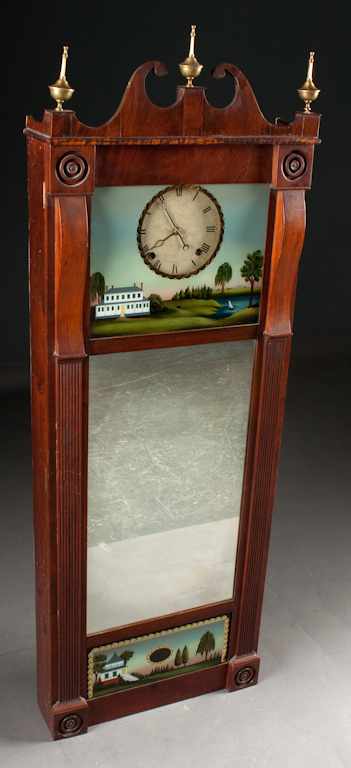 Appraisal: American classical mahogany and eglomise pillar and scroll clock second