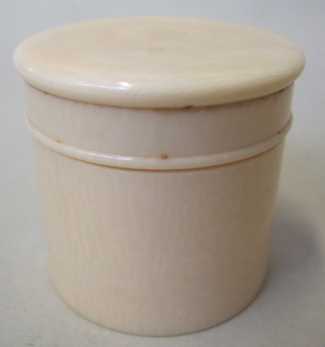 Appraisal: A turned ivory lidded pot stamped J B VIKERY REGENT